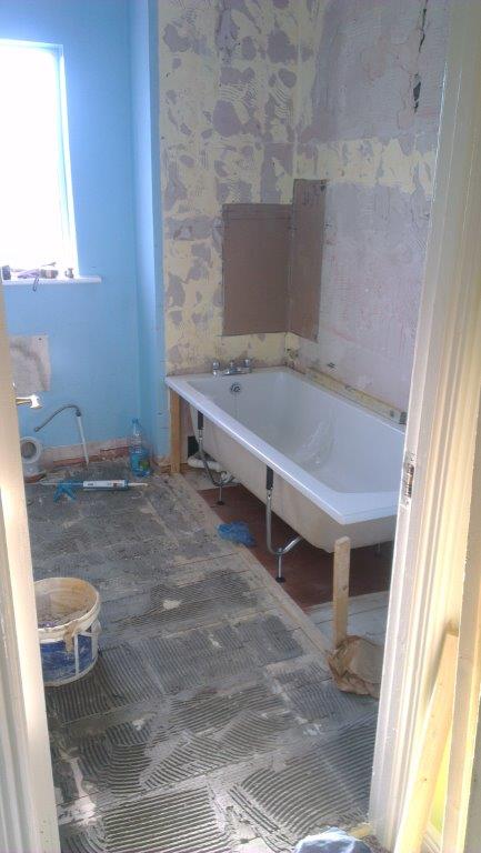 5. Refitting the bath and the replacing slabs